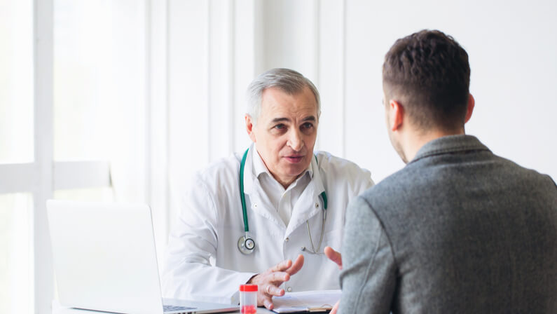 Doctor talking to his patient