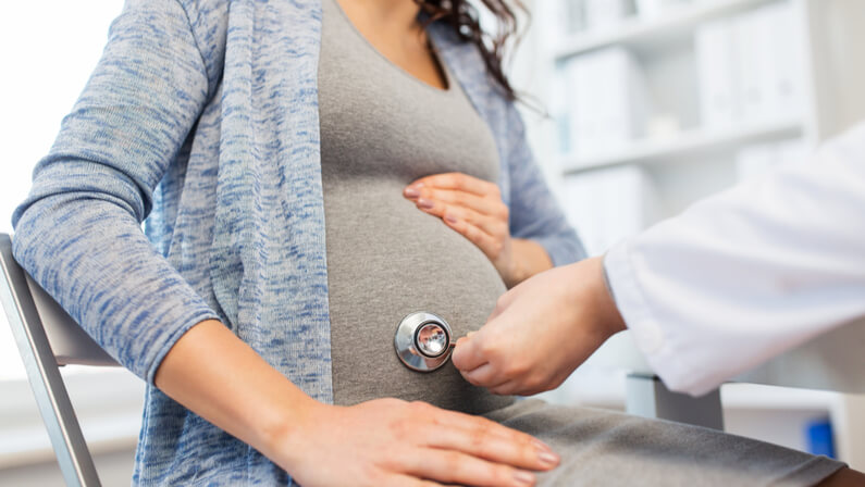 Pregnant woman with her doctor for a check up